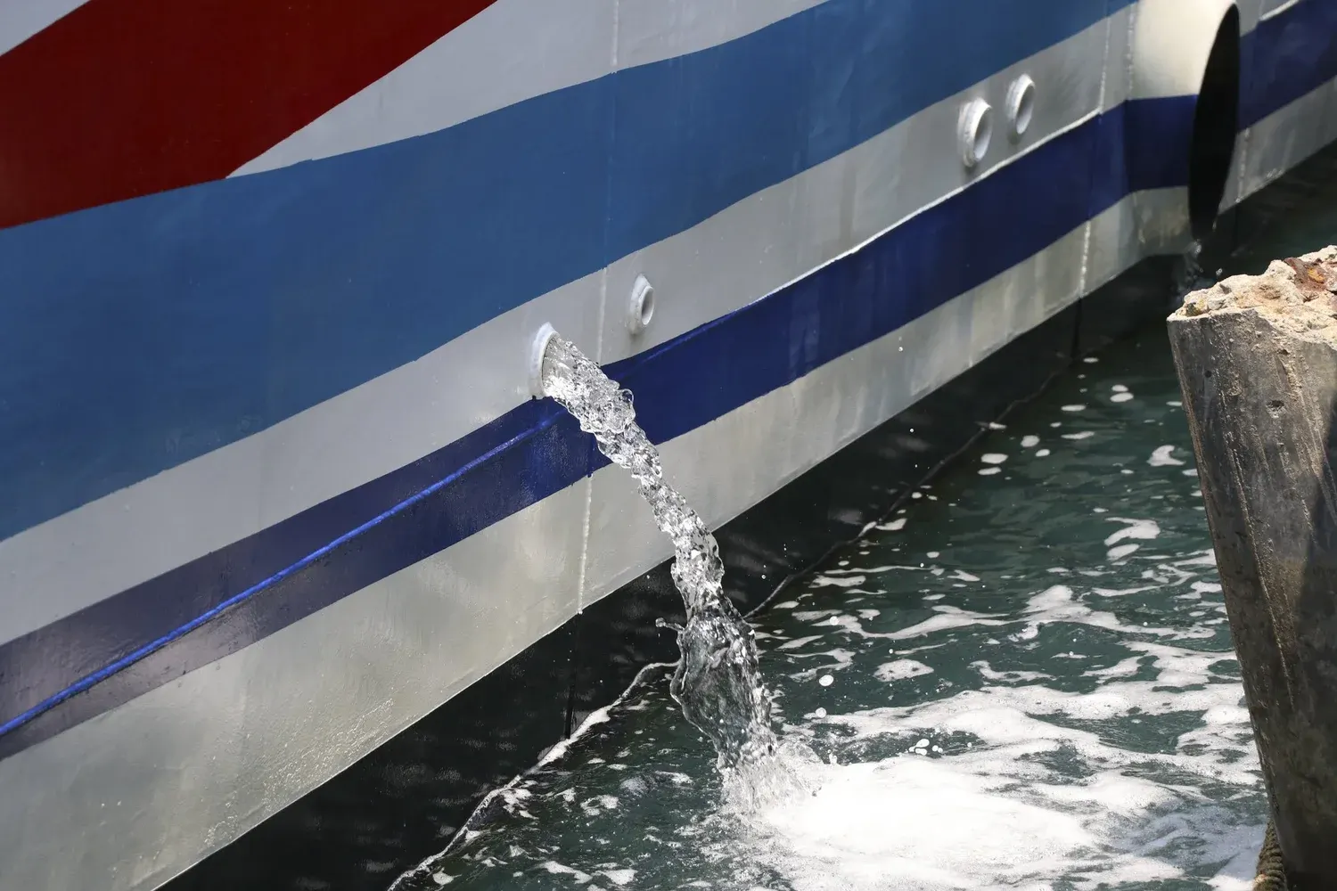 Open boat engine compartment and bilge area during cleaning