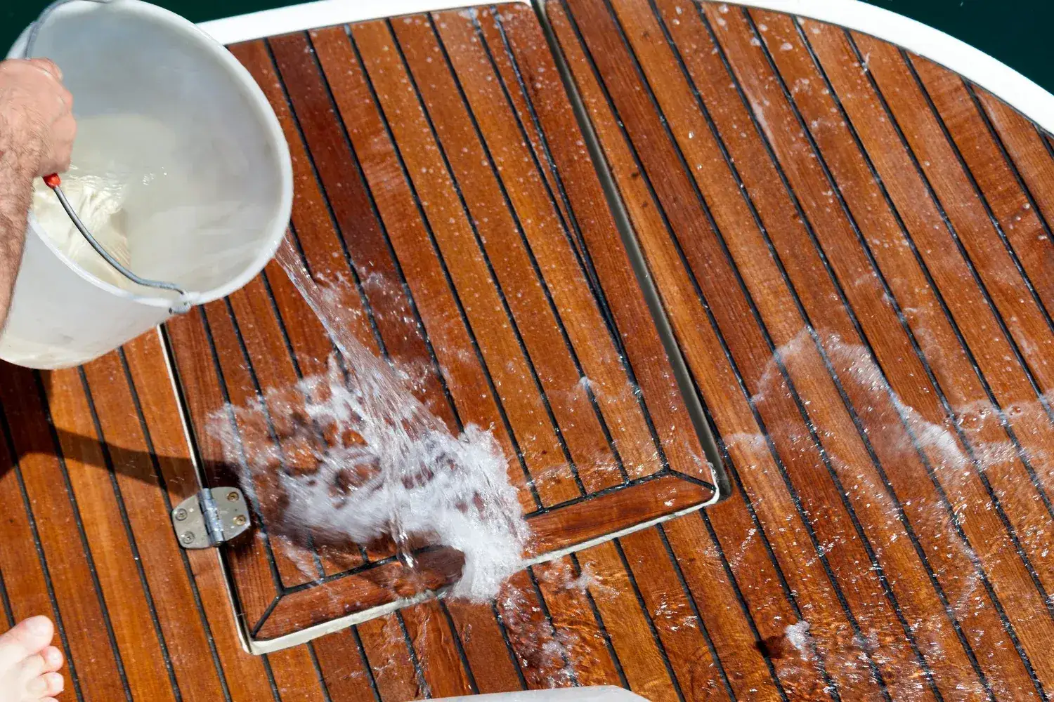Polished stainless steel rail and brightwork on a boat